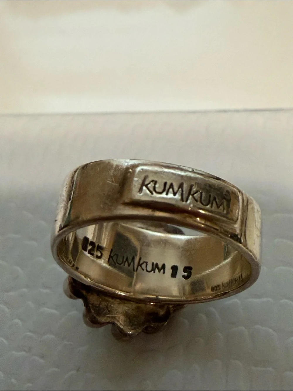 Vintage Sterling silver KumKum ring with blue topaz